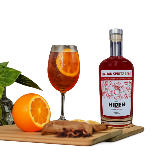 garrafa do aperitivo sem alcool italian spritz da marca miden com uma taça do lado